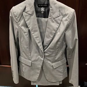 Business suit. Grey pin striped. Size 2
